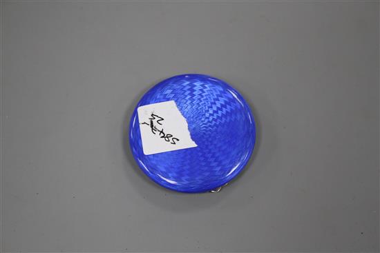 An early to mid 20th century silver gilt and guilloche enamel circular compact